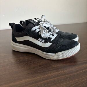 Vans women’s Black and White Sneakers size 7.5